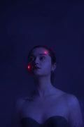 Rood licht therapie op het gezicht